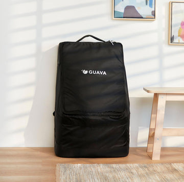 Roam Padded Roller Backpack tucked away by a wall